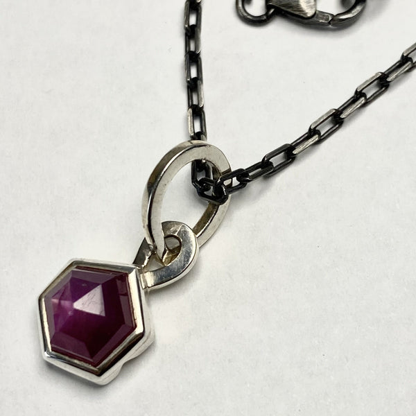 Ruby and Sterling Silver Pendant on Long Dark Chain